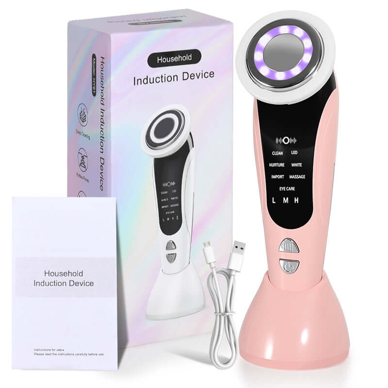 Pink induction device with packaging and USB cable on a white background