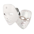 White LED face mask with a strap on a white background