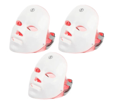 Three LED face masks on a white background