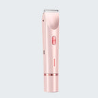 Rose gold hair trimmer on a light gray background